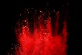 Red powder explosion isolated on black background. Royalty Free Stock Photo