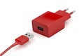 Red power adapter and USB cable