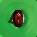 red power button on green background with shadow Royalty Free Stock Photo