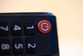 Remote control with a red power button close up Royalty Free Stock Photo
