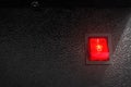 Red power switch on dark background. Electric control button Royalty Free Stock Photo