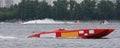 Red powerboat from f1 on water