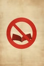 Red prohibition sign over a book, symbolic of the imperative to respect authors' rights and original works Royalty Free Stock Photo