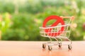 Red Prohibition symbol NO on a supermarket trading cart. Embargo, trade wars. Restriction on the importation of goods, proprietary Royalty Free Stock Photo