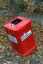 Red public trash container in Hamburg