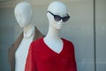 Red pullover on mannequin in fashion sotre showroom Royalty Free Stock Photo