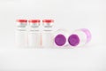 Red and purple cap injection vial Royalty Free Stock Photo