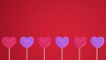 Red and purple hearts on a stick on a pink background. 3d rendering