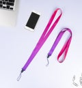 Red purple Polyester Cell Phone Holder Neck Lanyard With Plastic Clip. Royalty Free Stock Photo