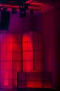 Red and Purple stage lighting for display interior wall panels