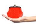 Red purse in woman hand isolated on white Royalty Free Stock Photo