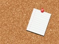 a cork board with a red pin sitting on top of it Royalty Free Stock Photo