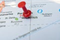 Red Push Pin Pointing Mauritius on Location of World Map Close-Up View