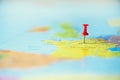 Red pushpin, thumbtack, pin showing the location, travel destination point on map. Copy space, lifestyle concept Royalty Free Stock Photo