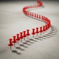 Red pushpins arranged in a curved pattern Royalty Free Stock Photo