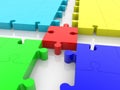 Red puzzle piece on empty row cross connects puzzle pieces of different colors Royalty Free Stock Photo