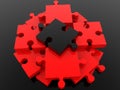 A red puzzle pyramid with a black puzzle at the top Royalty Free Stock Photo
