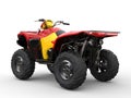 Red quad bike with yellow side panels Royalty Free Stock Photo