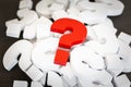 Red Question mark over group of White Question mark , Problem concept Royalty Free Stock Photo