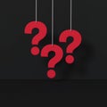 Red question marks on black room. FAQ Concept Royalty Free Stock Photo