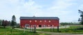 Red quilt Barn with Five Quilts