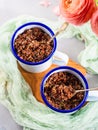 Red quinoa with vegetables in mugs