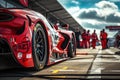 Red Race Car Speeding Down Race Track, A racing sports car freshly out of the pit stop, with crew members in the background, AI