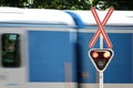 Red railway crossing signal Royalty Free Stock Photo