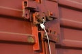 Red railway freight car with The lock on a door with a metal seal Royalty Free Stock Photo