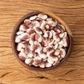 Red rajado beans in a bowl over wooden table Royalty Free Stock Photo