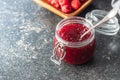 Red rasberries jam in jar Royalty Free Stock Photo