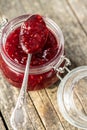 Red rasberries jam in jar Royalty Free Stock Photo