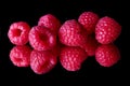 Red raspberries on a black background Royalty Free Stock Photo