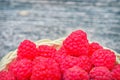 Red raspberries. Raspberry close-up on the table. Ripe red berry. Healthy and tasty food.