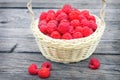 Red raspberries. Ripe berry in wicker basket. Raspberries in basket on the table. Royalty Free Stock Photo