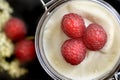 Red raspberrys with cream Royalty Free Stock Photo