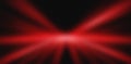 Red rays of light converging on dark background creating abstract design Royalty Free Stock Photo