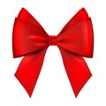 Red realistic bow. Gift decor satin ribbon bow. Lush satin ribbon bow. Isolated on white background Royalty Free Stock Photo