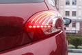 Red rear stop light of a red car is on Royalty Free Stock Photo