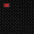 Red rectangle rocker power switch in on position, black abstract dot texture frame vertical pattern, natural blank copy space