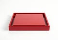 A red rectangular tray with a recessed center Royalty Free Stock Photo