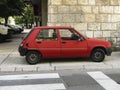 Red Renault 5 in Baja Pivljanina street, Cetinje, Montenegro.