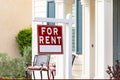 Red For Rent Real Estate Sign in Front House Royalty Free Stock Photo