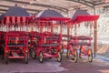 Red rental carts decorated with tasseled awnings at Songnisan National Park