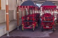 Red rental carts decorated with tasseled awnings at Songnisan National Park