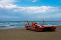 Red rescue boat on the beach Royalty Free Stock Photo