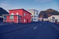 Red residential building on an empty street in Vestmannaeyjar, Iceland Royalty Free Stock Photo