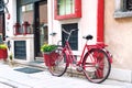 Red retro bicycle. Outdoors.