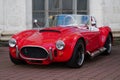 Red retro car Shelby Cobra stands at central Expo Center in Kyiv, Ukraine Royalty Free Stock Photo