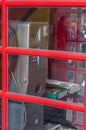 Red retro english telephone box close up, United Kingdom traction design, classic reference information box. Royalty Free Stock Photo